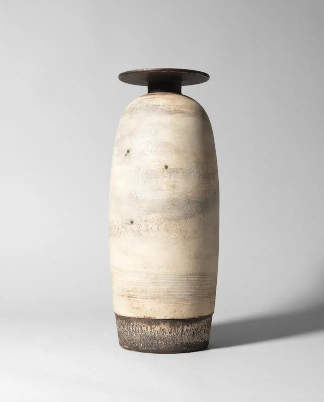 Important tall bottle vase with disc by Hans Coper - Auction record, sale price, and art valuation. Compare with similar artists and explore comparable artworks.