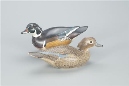 Outstanding Wood Duck Pair by Lloyd Johnson - Auction record, sale price, and art valuation. Compare with similar artists and explore comparable artworks.