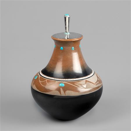 Turquoise Inlay Jar with Silver Lid by Tony Da - Auction record, sale price, and art valuation. Compare with similar artists and explore comparable artworks.