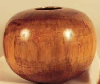 Sample artwork by Edward Moulthrop (1916 - 2003), known for sculptor-turned wood vessels - View similar artists and auction records