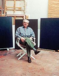 Portrait of Fernand Leduc: Leduc in his Paris studio with Microchromies in background (2000)