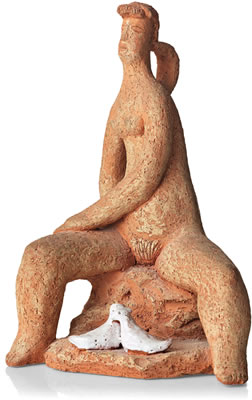 Seated woman with a pair of white glazed doves