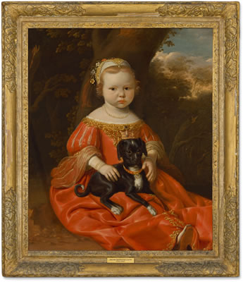 Portrait of a young girl in a red dress with her dog in a landscape