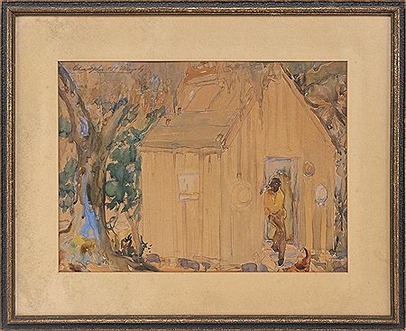 A man outside a cabin