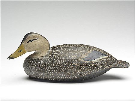 Outstanding and important hollow carved black duck