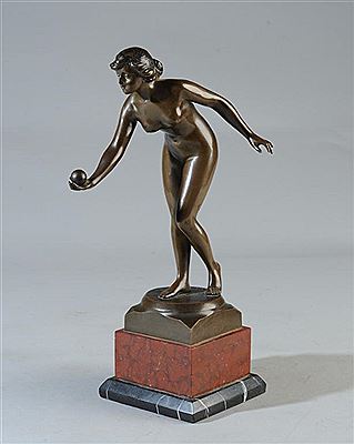 Female nude playing ball