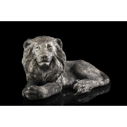 Silver crouched lion figure