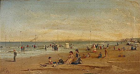 Many families playing and bathing on the beach in Trouville in France