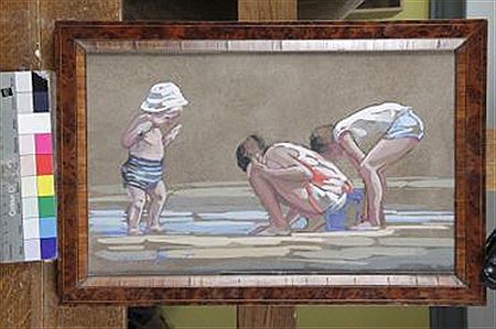 Children praying on the beach