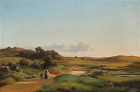 A young woman and a little girl walking on a country road.
