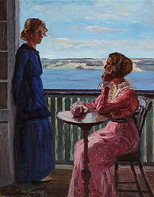 Two women on a balcony with a view of Vejle fiord