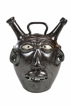 DOUBLE SIDED FACE JUG