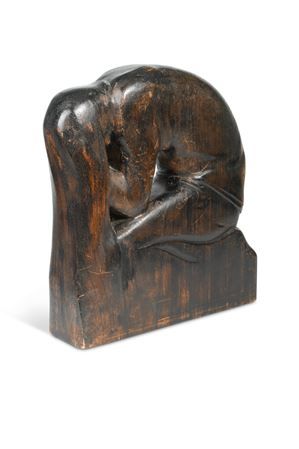 Girl Washing Hair, a carved wood figure