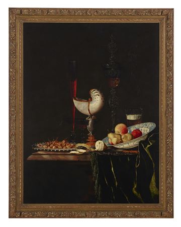 A nautilus cup, a flute, a façon-de-Venise and a wine and beer glass with nuts on a silver charger, a peeled lemon and fruit in a Kraak porcelain bowl on a partially draped stone table