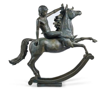 BOY ON A MAGIC ROCKING HORSE