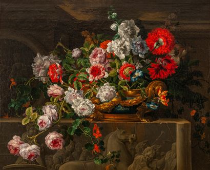 A lapis vase mounted in gold filled with flowers