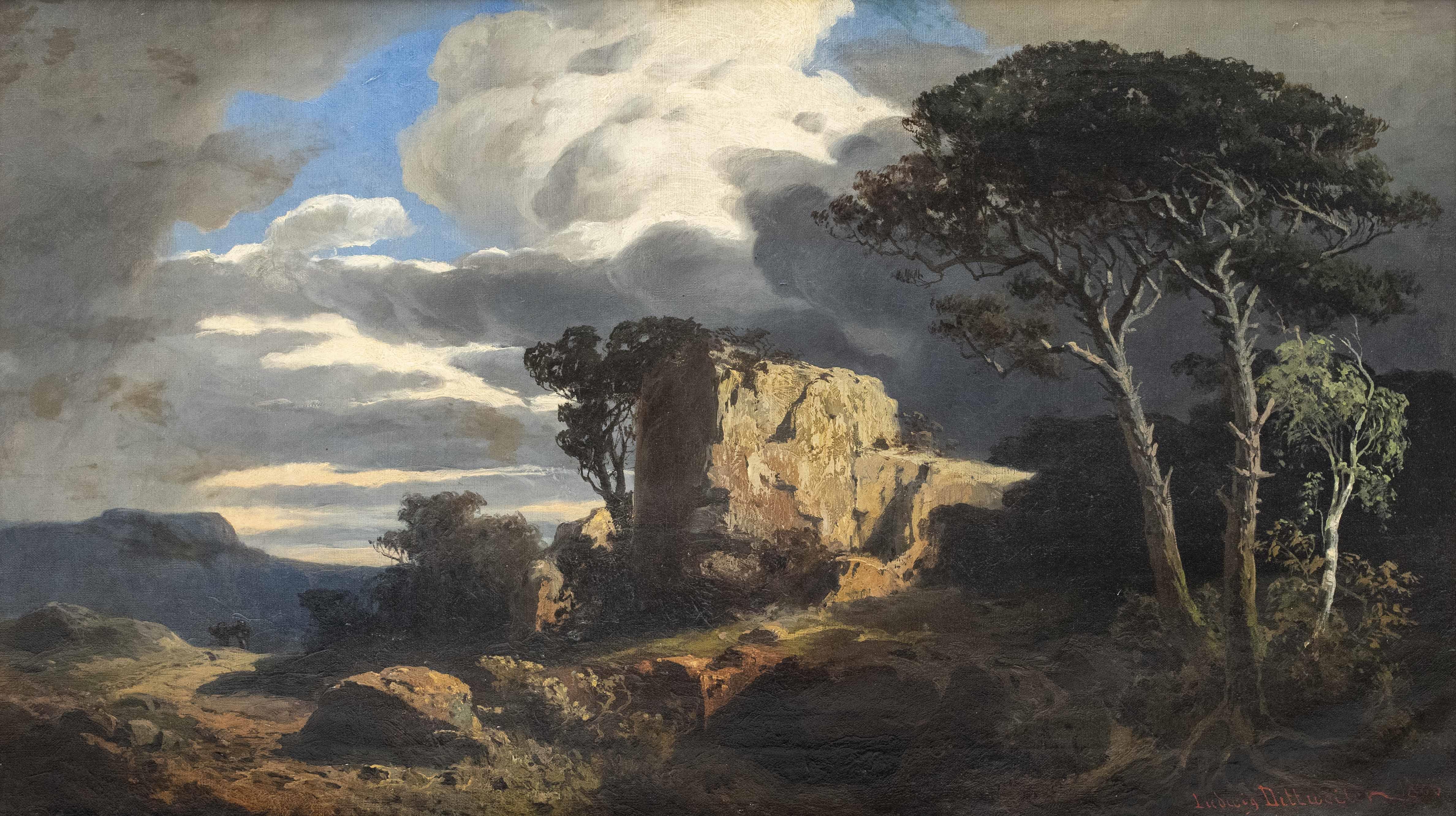 Stormy sky over a rocky landscape with trees