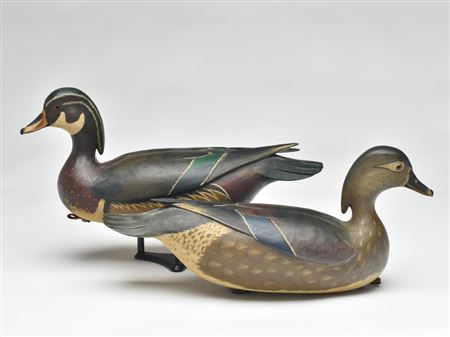 Well carved pair of wood ducks