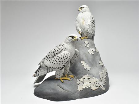 Pair of carved gyrfalcon