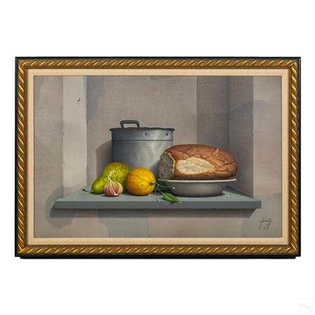 A still life scene with orange, pear, garlic, bread, and cooking pot.