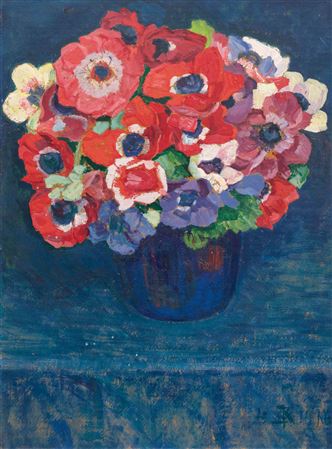Anemones in a blue vase.