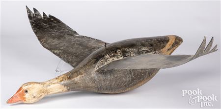 Flying Canada Goose decoy by Lou Schifferl - Auction record, sale price, and art valuation. Compare with similar artists and explore comparable artworks.
