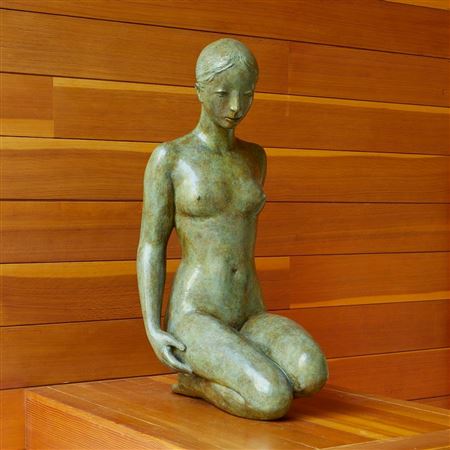 Kneeling nude woman