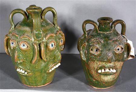 Pair of Multi-Face Jugs.