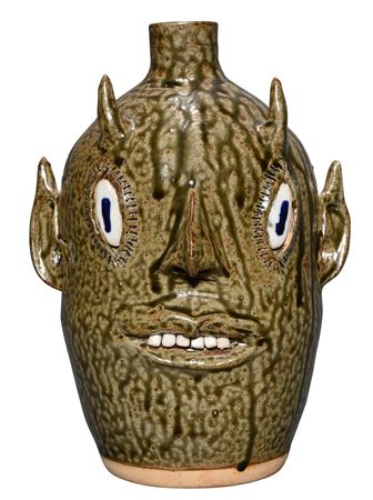 Sample artwork by Alva Meaders (1923 - 1993), known for sculpture--face jugs - View similar artists and auction records