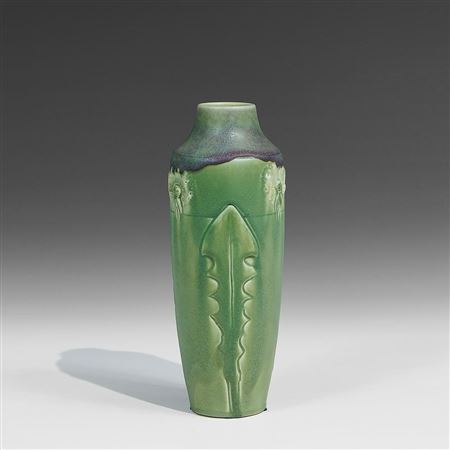 Carved and painted vase with dandelion decoration in purple over green glaze and yellow highlights, shape number 946V by Rose Fechheimer - Auction record, sale price, and art valuation. Compare with similar artists and explore comparable artworks.