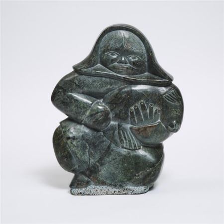 WOMAN HOLDING A SEAL