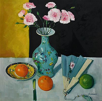 Still life with a vase, carnations, fruit and a fan on a table