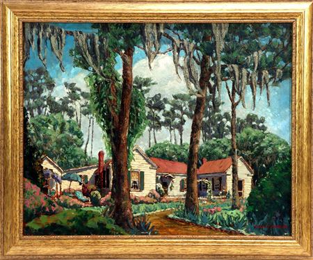 South Carolina landscape of a home amongst Spanish moss trees.
