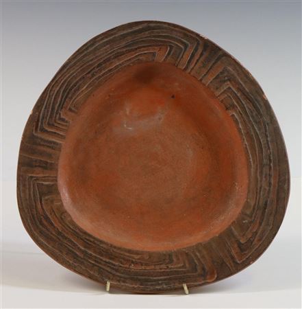 Redware shallow bowl with wide geometric lip