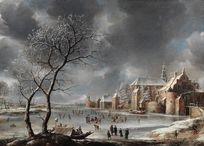 A winter landscape with skaters on a river near a town