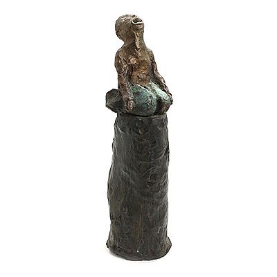 Seated figure.