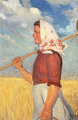 A young harvest worker walking in front of a ripe cornfield