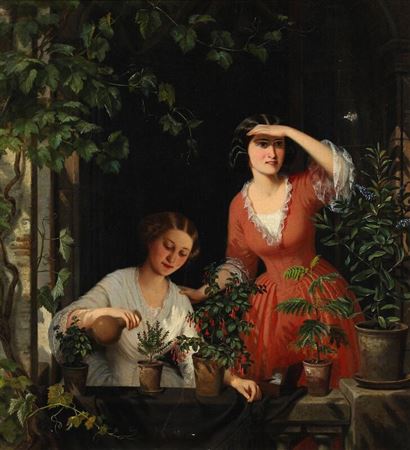 Two young women on a veranda.