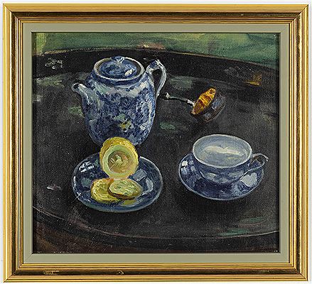 Teapot with lemons