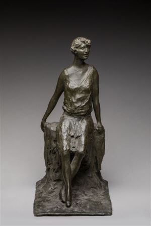 "Young seated woman with a pleated dress".