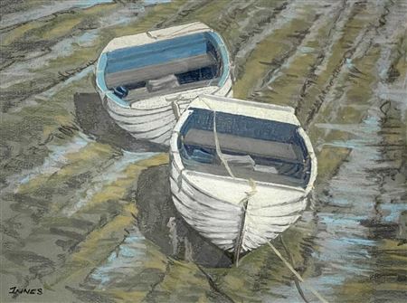 Two row boats at low tide