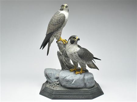 Pair of decorative peregrine falcons