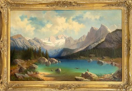 Turquoise mountain lake with alpine panorama