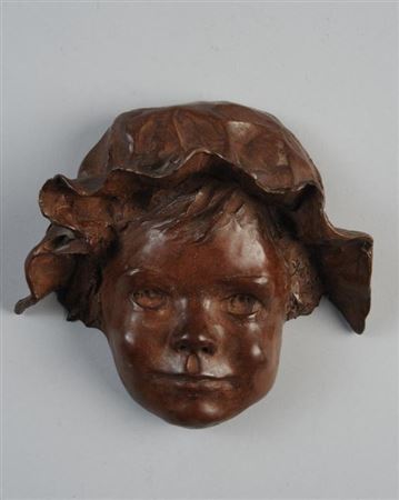 Bronze portrait of a child wearing a hat by Glenna Goodacre