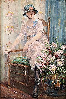 Young girl with a flowery hat in her interior.