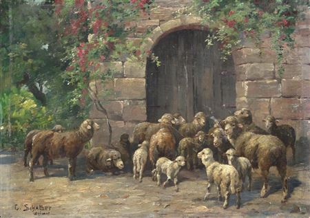 Flock of sheep with lambs in front of closed gate