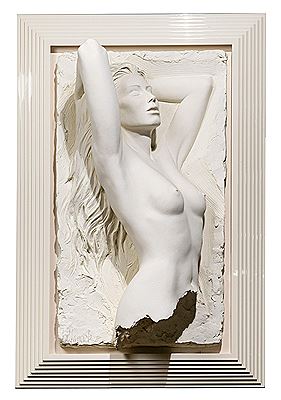 A bust of a nude female