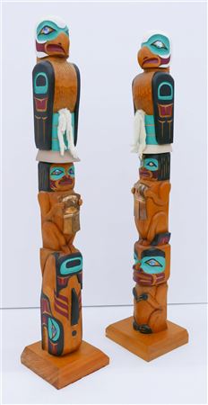 PAIR OF EAGLE CHIEF TOTEM MODELS