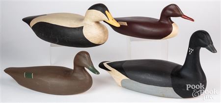Four duck decoys