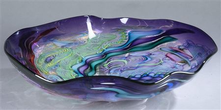 Large art glass bowl with swirled multi-colored sections and glitter